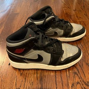 Black and Grey Jordan 1 Mid